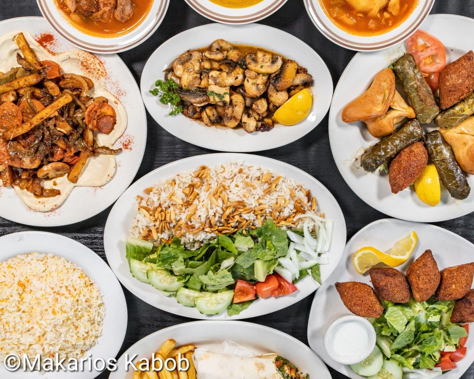 Family-style catering spread from Ranch House Makarios Family Restaurant in Vestavia Hills, AL