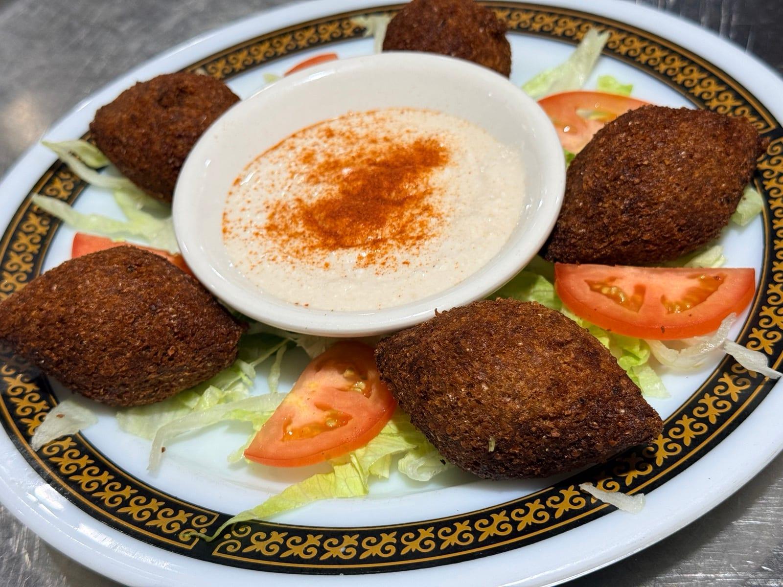 Fried kibba appetizer with sauce at Ranch House Makarios Family Restaurant in Vestavia Hills, AL