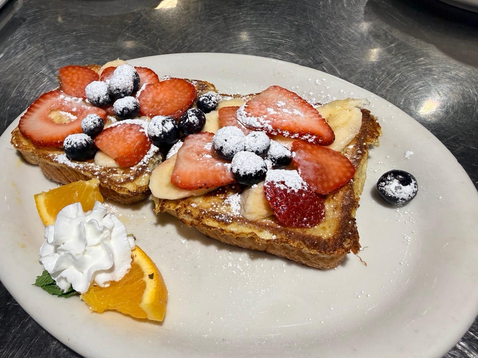 Fruity French toast with strawberries, blueberries and banana at Ranch House Makarios in Vestavia Hills, AL