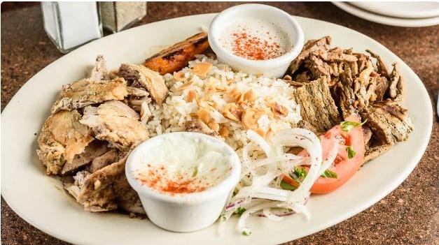 Shawarma plate with rice, grilled meat and sauces at Ranch House Makarios Family Restaurant in Vestavia Hills, AL