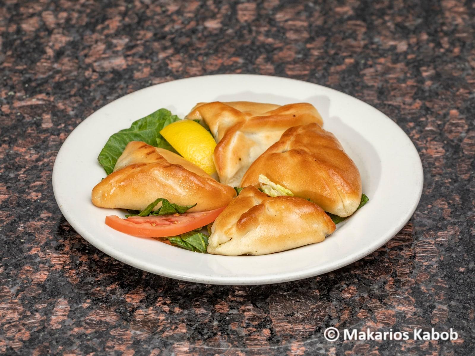 Spinach and meat pies appetizer at Ranch House Makarios Family Restaurant in Vestavia Hills, AL